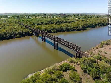 Aerial view of the old railroad bridge over the Arapey Grande River - Department of Salto - URUGUAY. Photo #81150
