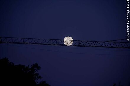 Full moon behind the crane boom -  - MORE IMAGES. Photo #81953