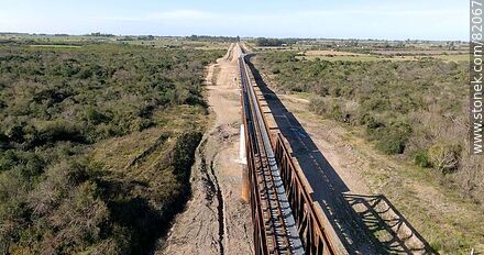 Aerial view of the final section of the railway bridge over the Santa Lucia river to Canelones - Department of Florida - URUGUAY. Photo #82067