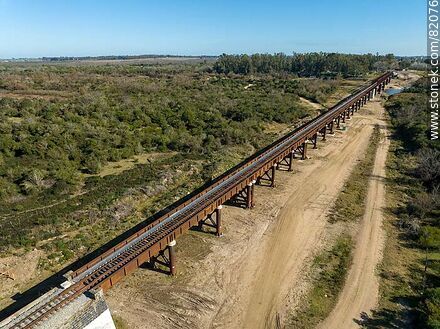 Aerial view of the recycled railroad bridge over the Santa Lucia river, departmental boundary between Canelones and Florida. Drought of 2023 - Department of Florida - URUGUAY. Photo #82076