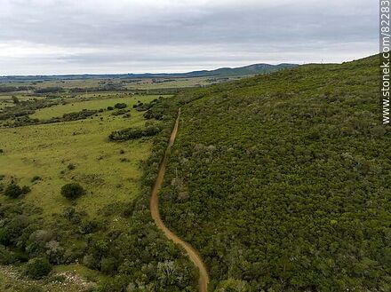 Aerial view of the road to the Buddhist temples in the Carapé mountain range - Lavalleja - URUGUAY. Photo #82283