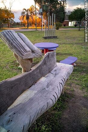 Rustic wooden bench with a book - Soriano - URUGUAY. Photo #83447
