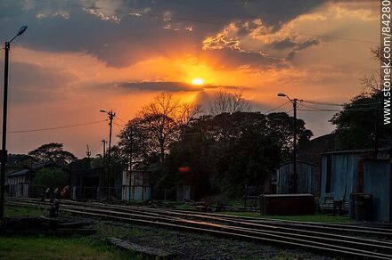 Sun rising through the clouds near the train station in Salto. - Department of Salto - URUGUAY. Photo #84280