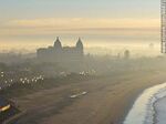 Vista aérea de la rambla República de México al amanecer con bruma y la silueta del hotel Carraasco - Foto #86871