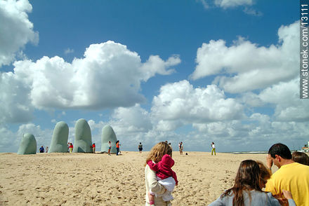 A boy and his mother on Playa Brava's - Punta del Este and its near resorts - URUGUAY. Photo #13111