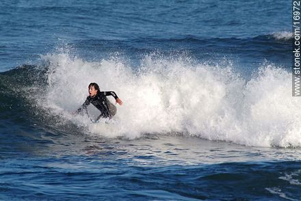 Surfer in Brava beach - Punta del Este and its near resorts - URUGUAY. Foto No. 16972