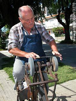 The rear part of the bicycle has the sharpener. - Department of Montevideo - URUGUAY. Photo #3270